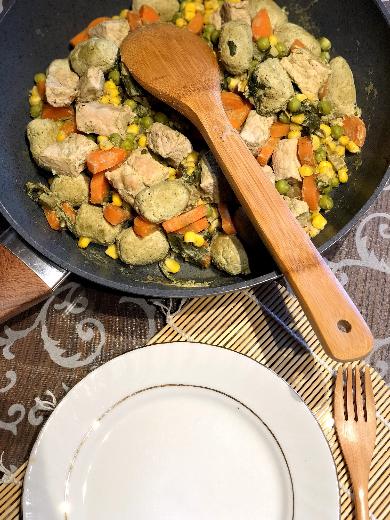 Pork-vegetables with pumpkin seed dumplings and pesto